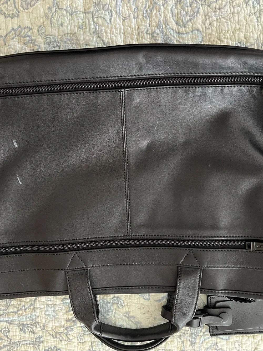Tumi sleek leather